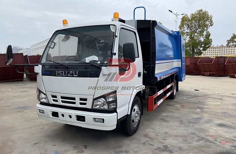 Lori sampah pemuat belakang ISUZU QKR 5CBM