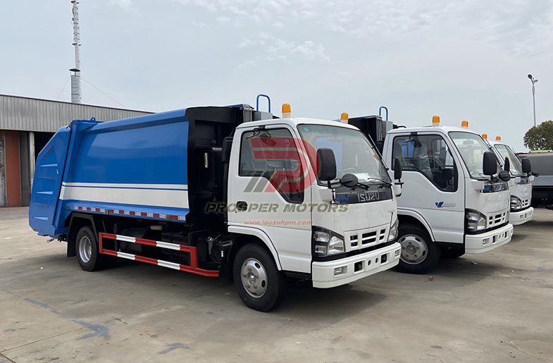 Lori sampah pemuat belakang ISUZU QKR 5CBM