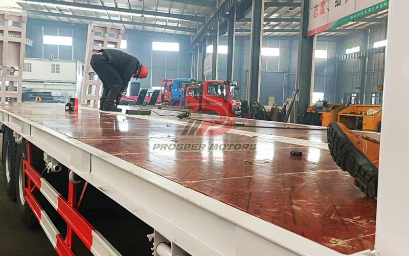 Skip loader truck assembly 