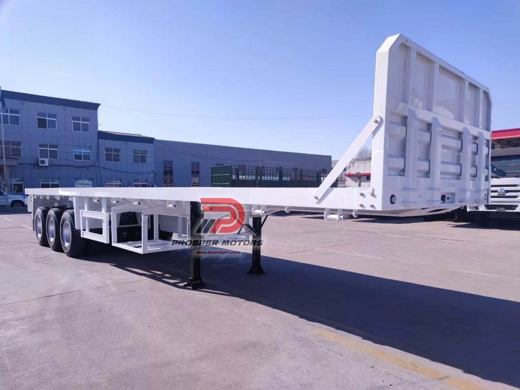 Three-axle heavy-duty flatbed cargo semi trailer with protective tailgate